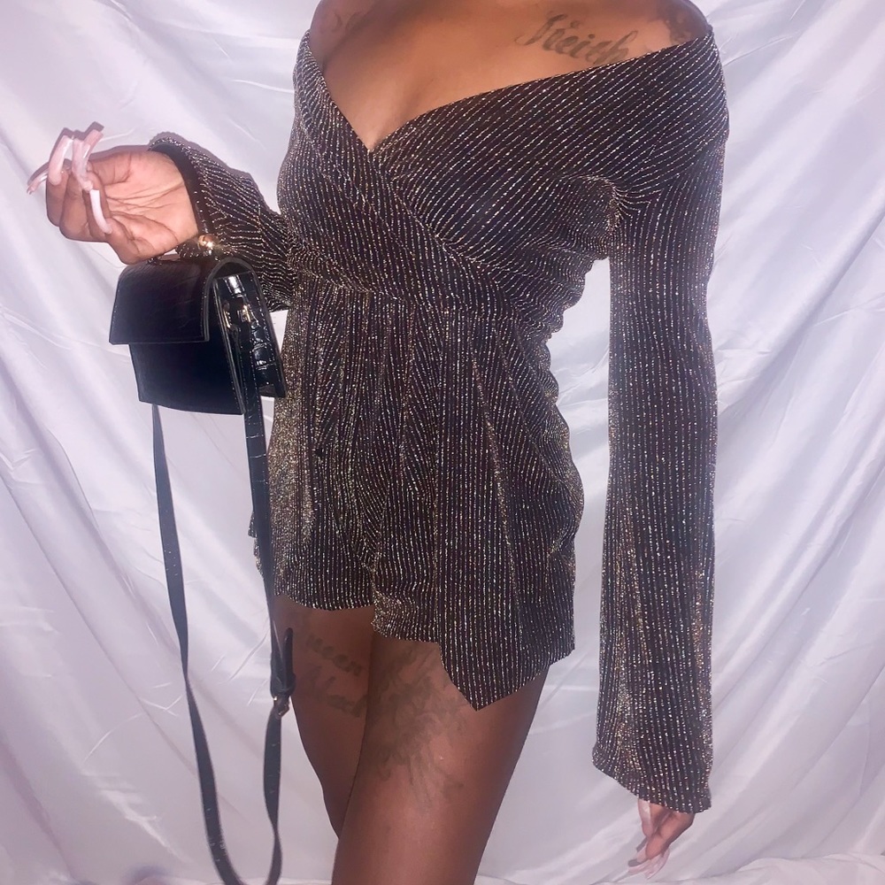 Black Romper silver and gold glitter lines